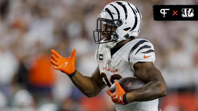 Joe Mixon (28) runs with the ball for a touchdown against the Los Angeles Rams in the second half at Paycor Stadium.