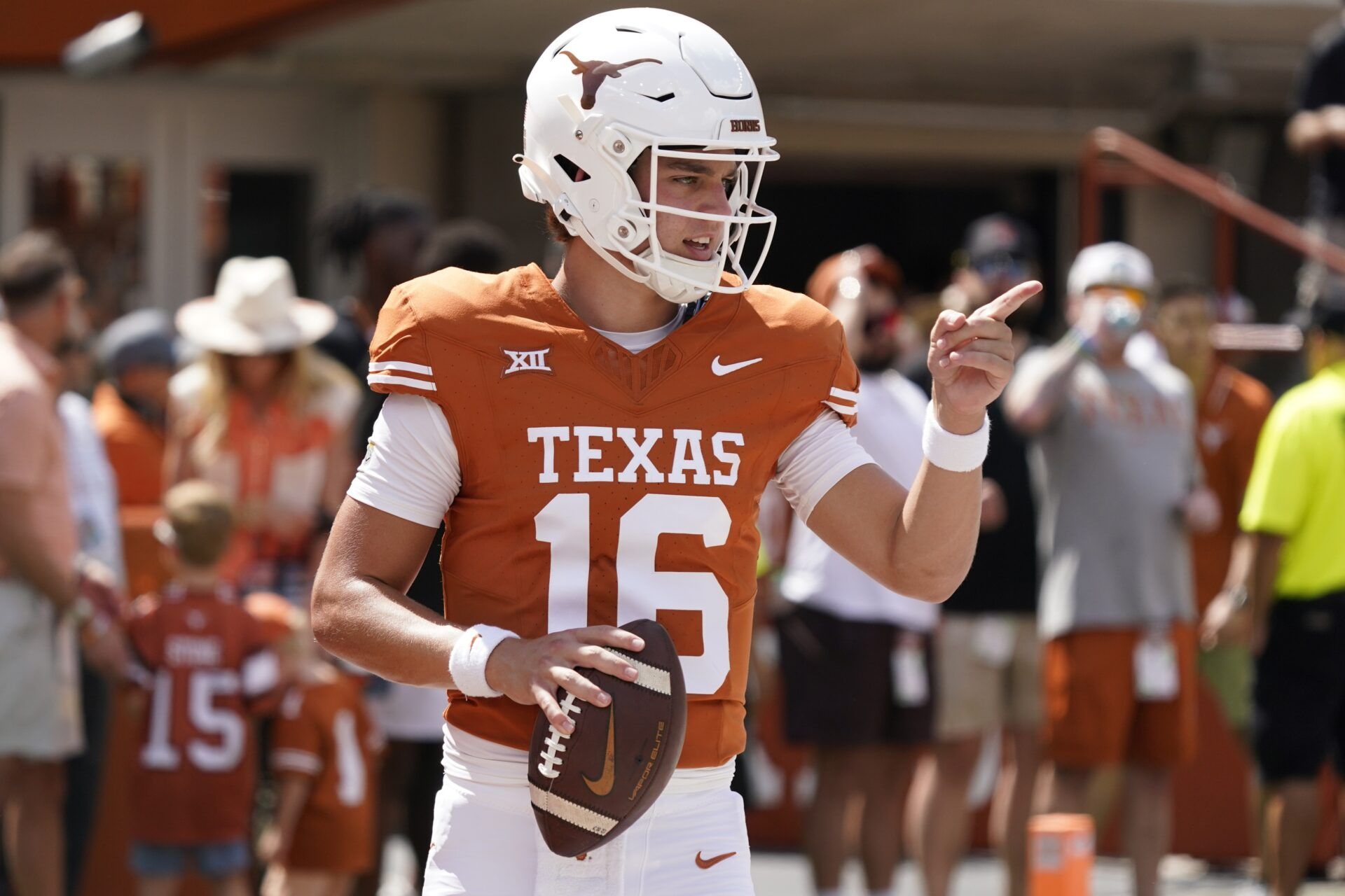 Arch Manning (16) warms up before the game against the Kansas Jayhawks at Darrell K Royal-Texas Memorial Stadium.