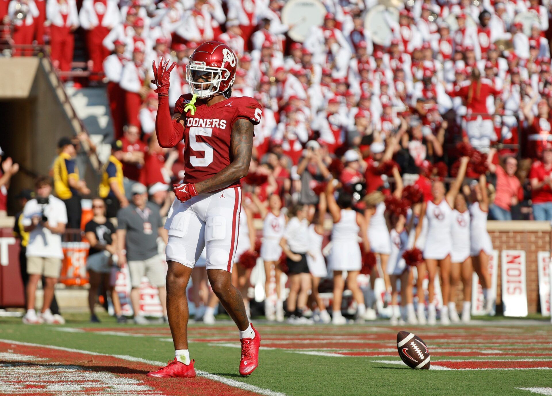 Andrel Anthony (5) celebrates a touchdown in the first half during the college football game between the University of Oklahoma Sooners and the Southern Methodist University Mustangs.