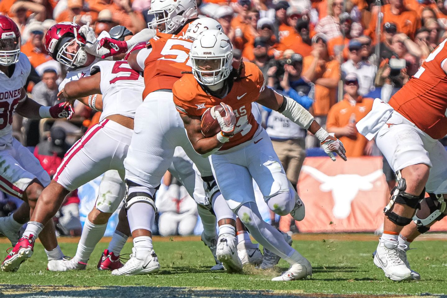 Jonathon Brooks (24) runs the ball agaist Oklahoma during the game at the Cotton Bowl.