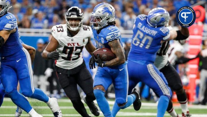 Jahmyr Gibbs (26) runs against Atlanta Falcons during the second half at Ford Field in Detroit.