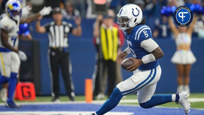 Indianapolis Colts quarterback Anthony Richardson (5) scores a touchdown during the second half of the game against the Los Angeles Rams.