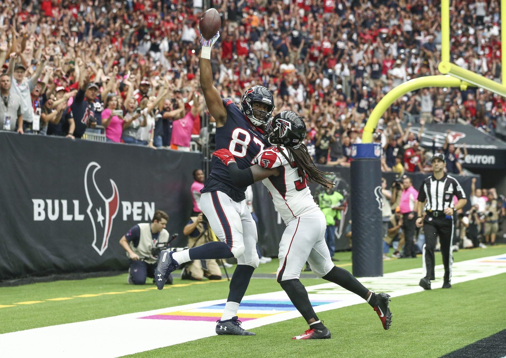 Houston Texans tight end Darren Fells (87) catches a pass for a touchdown against Atlanta Falcons defensive back Kemal Ishmael (36) during the fourth quarter at NRG Stadium.