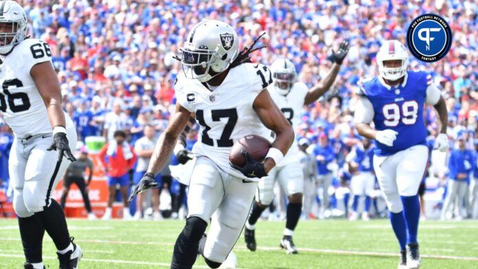 Las Vegas Raiders wide receiver Davante Adams (17) runs for the end zone to score a touchdown in the first quarter against the Buffalo Bills at Highmark Stadium.