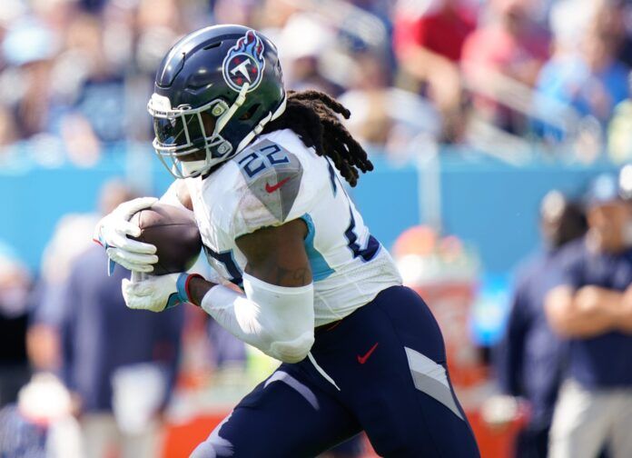 Tennessee Titans running back Derrick Henry (22) runs the ball in the third quarter against the Los Angeles Chargers at Nissan Stadium in Nashville, Tenn., Sunday, Sept. 17, 2023