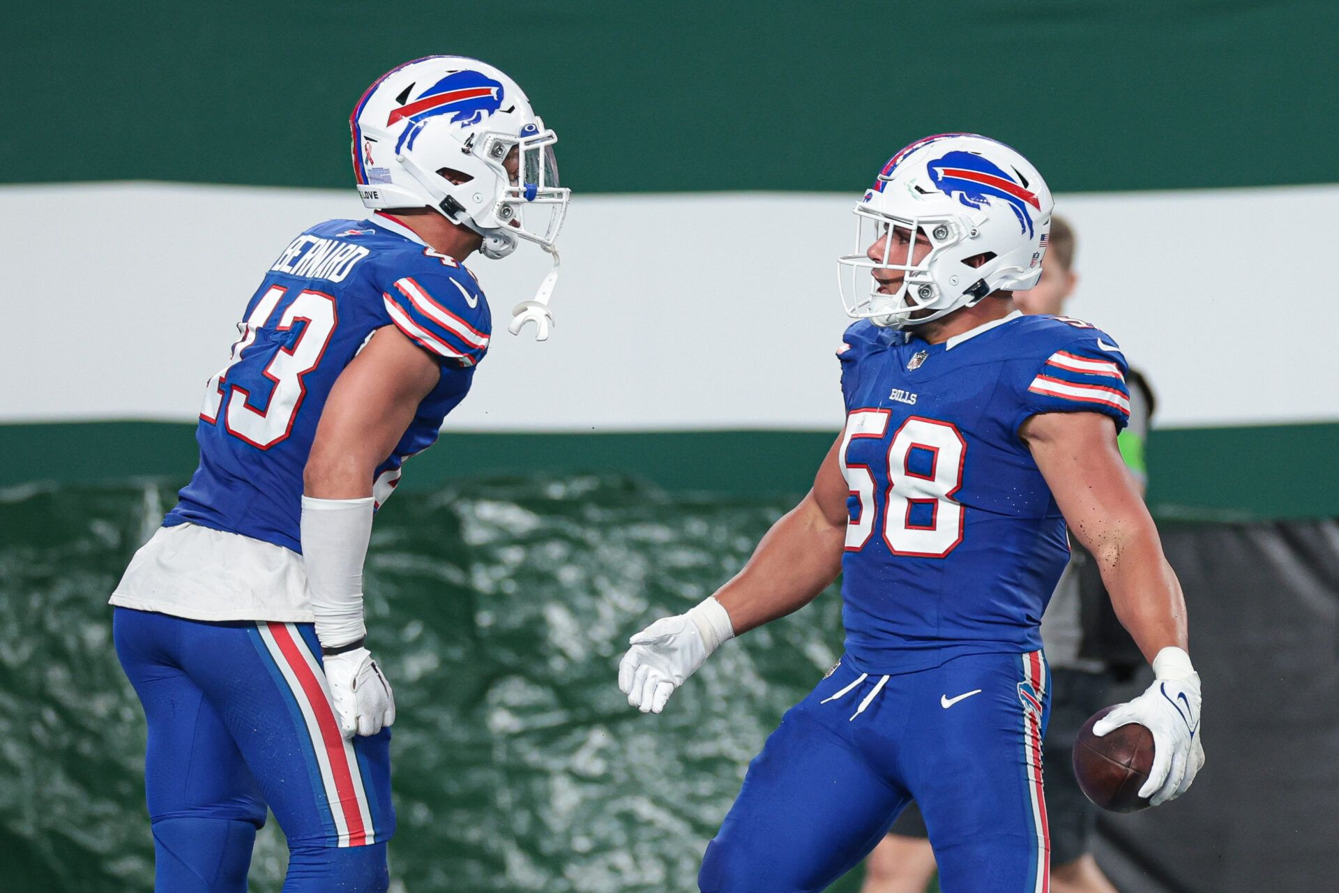 Buffalo Bills linebacker Matt Milano (58) reacts after his interception with linebacker Terrel Bernard (43).