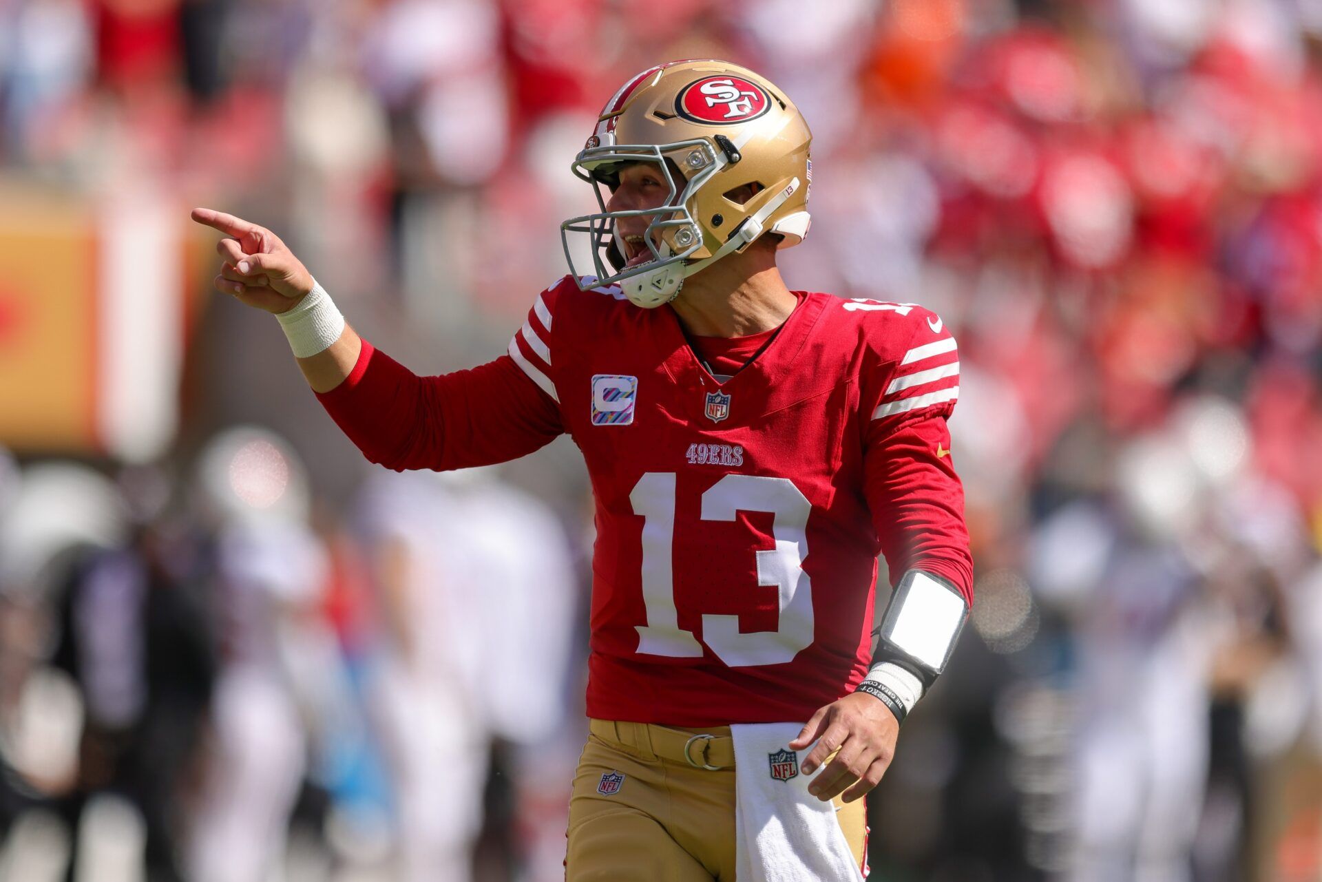 San Francisco 49ers quarterback Brock Purdy (13) celebrates after a touchdown during the second quarter against the Arizona Cardinals at Levi's Stadium.