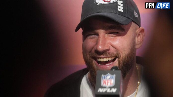 Kansas City Chiefs TE Travis Kelce laughs while talking to the media.