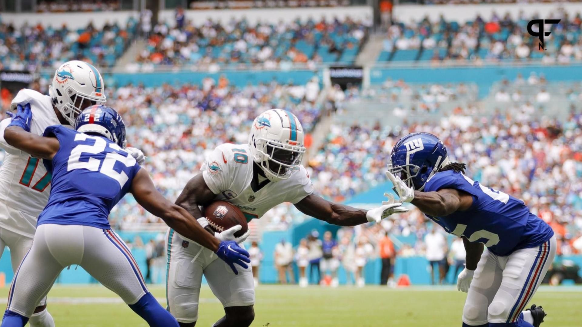 Miami Dolphins WR Tyreek Hill (10) runs after the catch against the New York Giants.