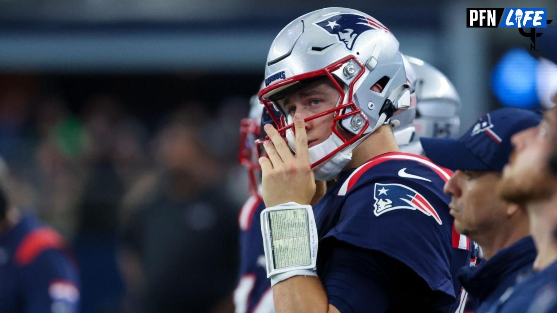 New England Patriots QB Mac Jones (10) on the sidelines.