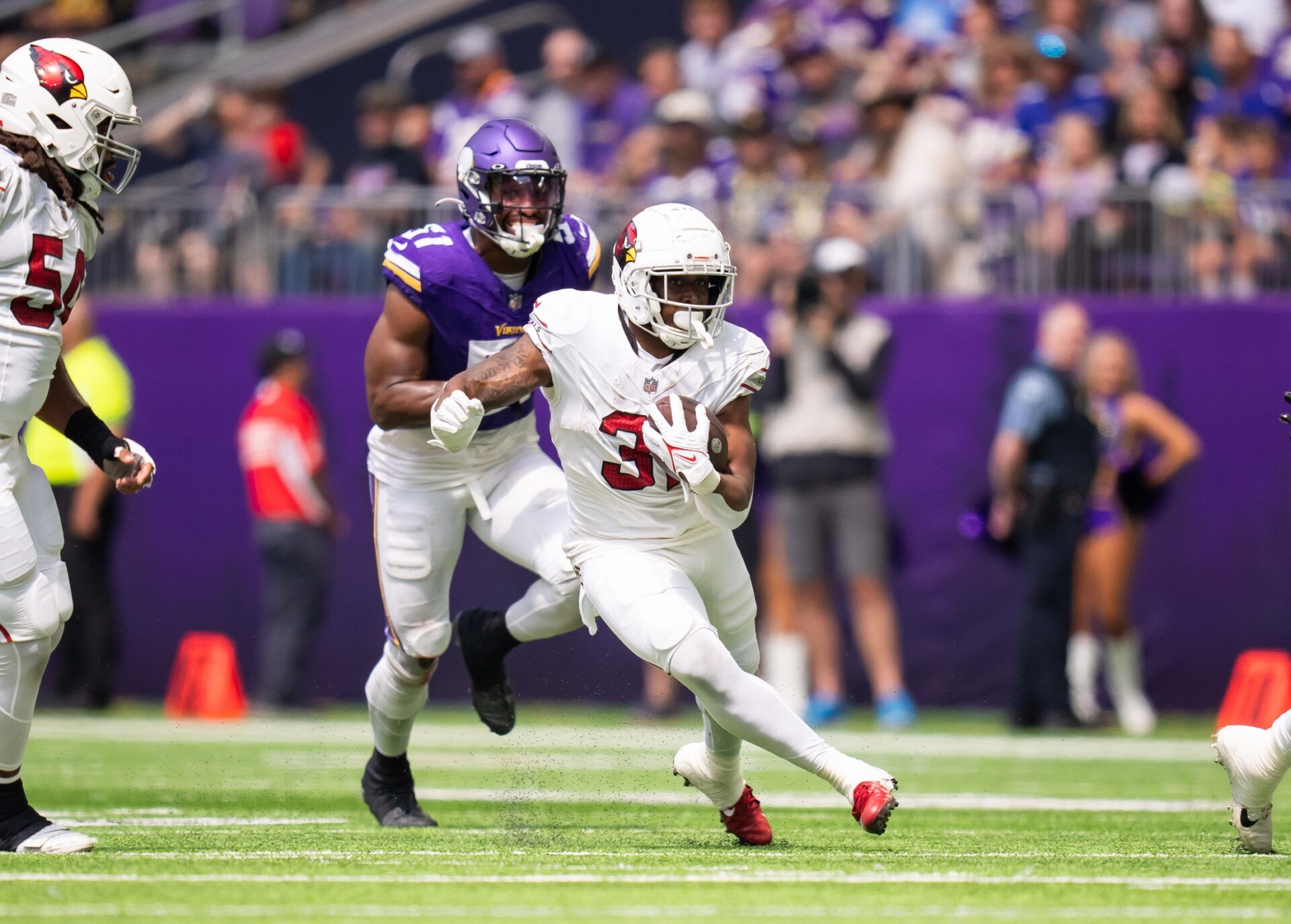 Arizona Cardinals RB Emari Demercado runs with ball in preseason game vs. Minnesota Vikings.