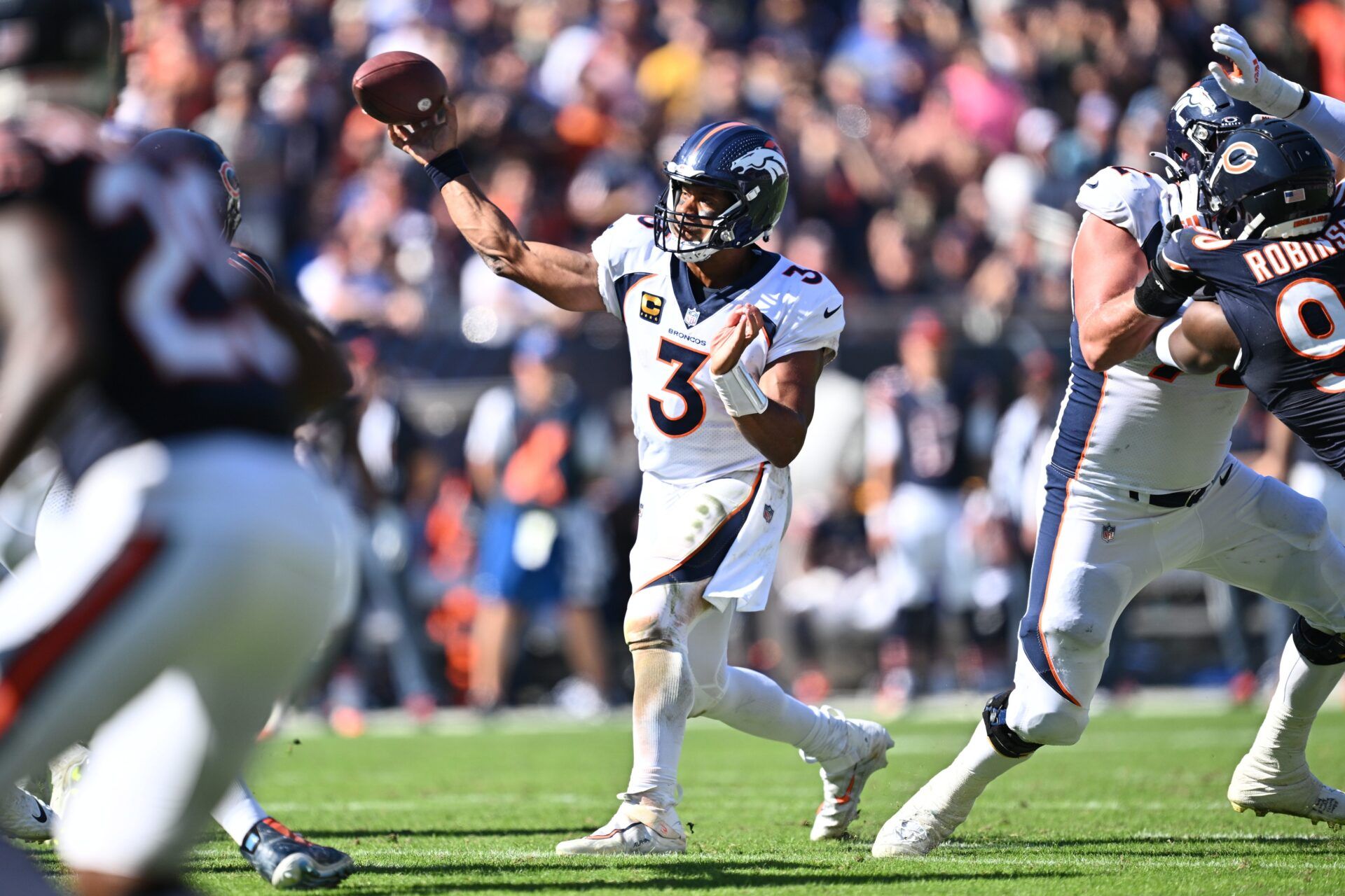 Denver Broncos QB Russell Wilson passes against the New York Jets.