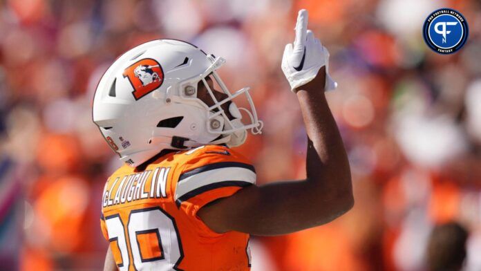 Jaleel McLaughlin (38) celebrates his rushing touchdown in the first quarter against the New York Jets at Empower Field at Mile High.