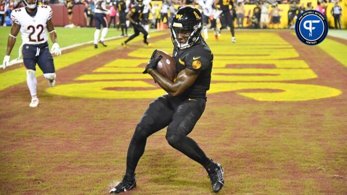 Curtis Samuel (4) scores a touchdown against the Chicago Bears during the second half at FedExField.