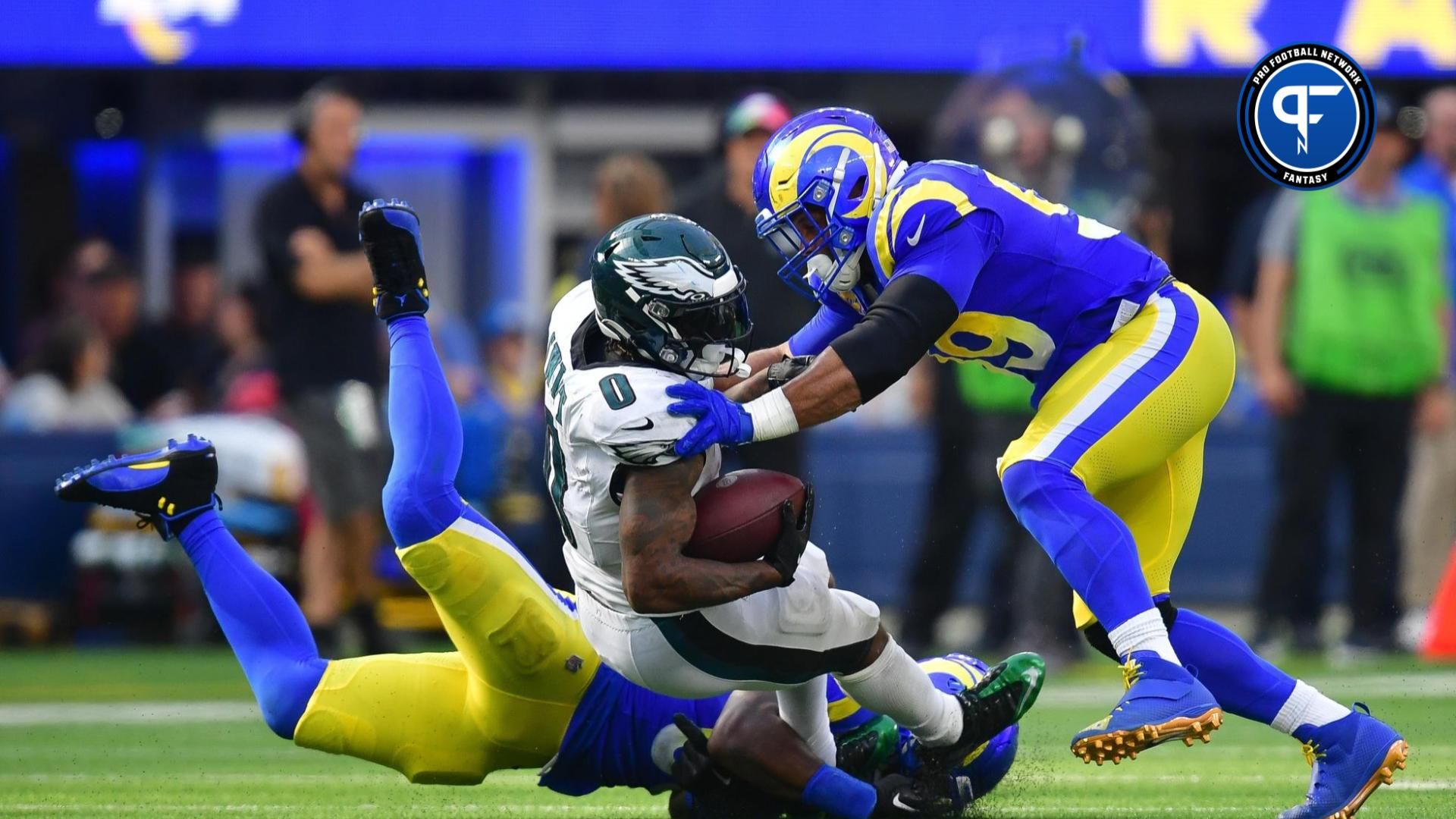 Los Angeles Rams DT Aaron Donald tackles Philadelphia Eagles RB D'Andre Swift.