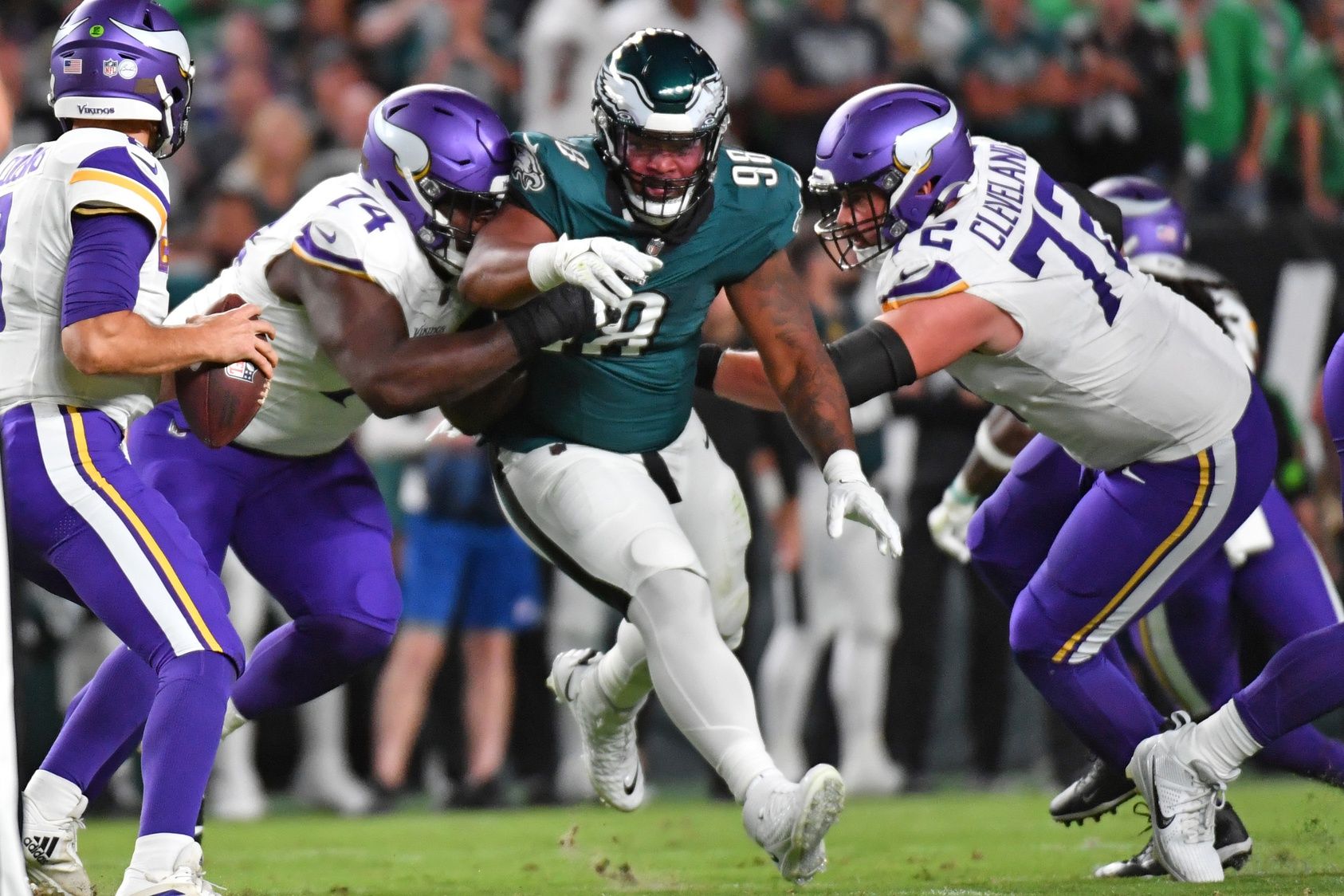 Jalen Carter (98) is blocked by Minnesota Vikings offensive tackle Olisaemeka Udoh (74) and guard Ezra Cleveland (72) at Lincoln Financial Field.