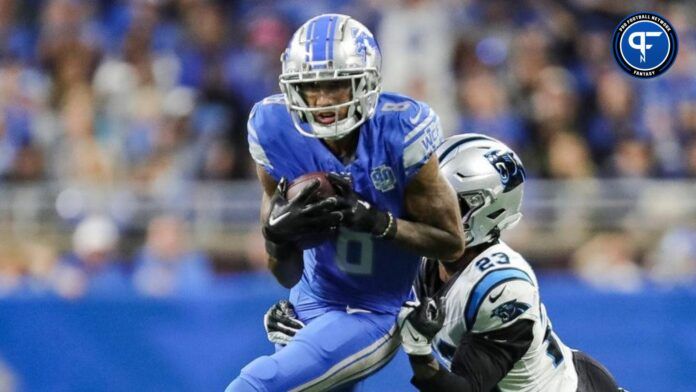 Josh Reynolds makes a catch against Panthers cornerback CJ Henderson during the second half of the Lions' 42-24 win.