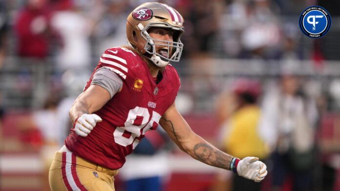 George Kittle (85) reacts after scoring a touchdown against the Dallas Cowboys during the second quarter at Levi's Stadium.