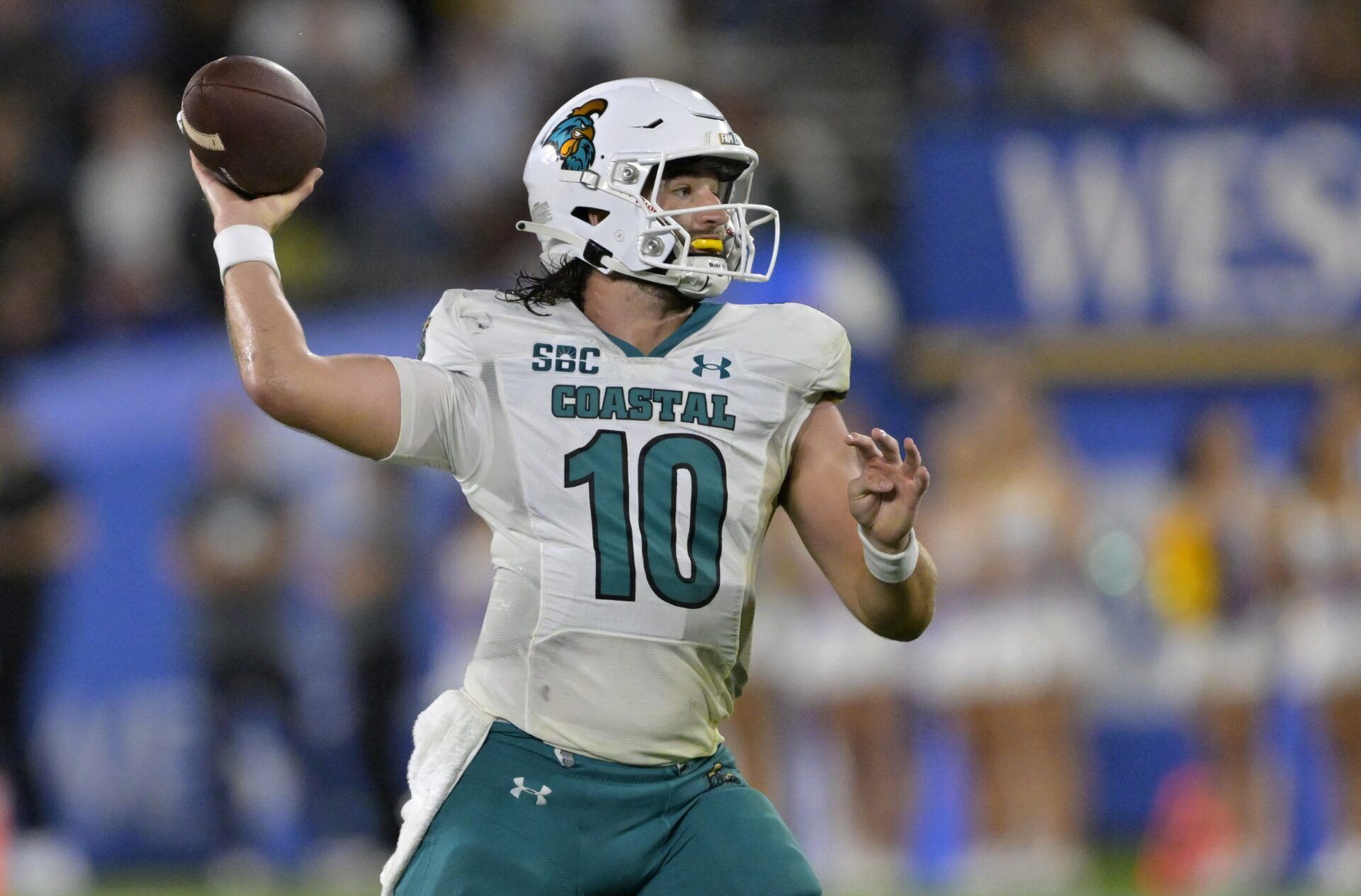 Coastal Carolina Chanticleers QB Grayson McCall (10) throws a pass against UCLA.