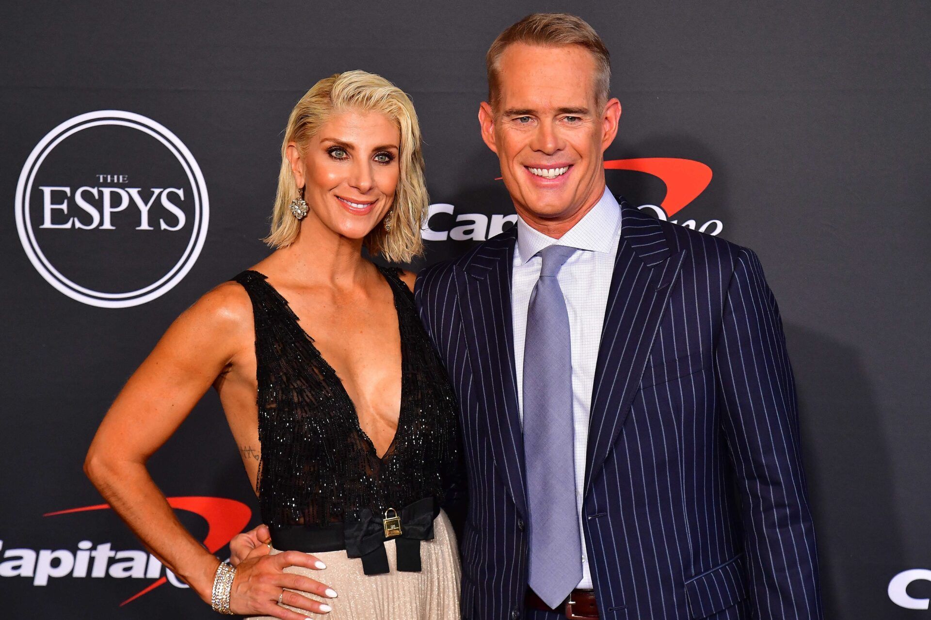 Sports broadcaster Joe Buck and his wife, Michelle Beisner-Buck, pose for a photo at the ESPYs.