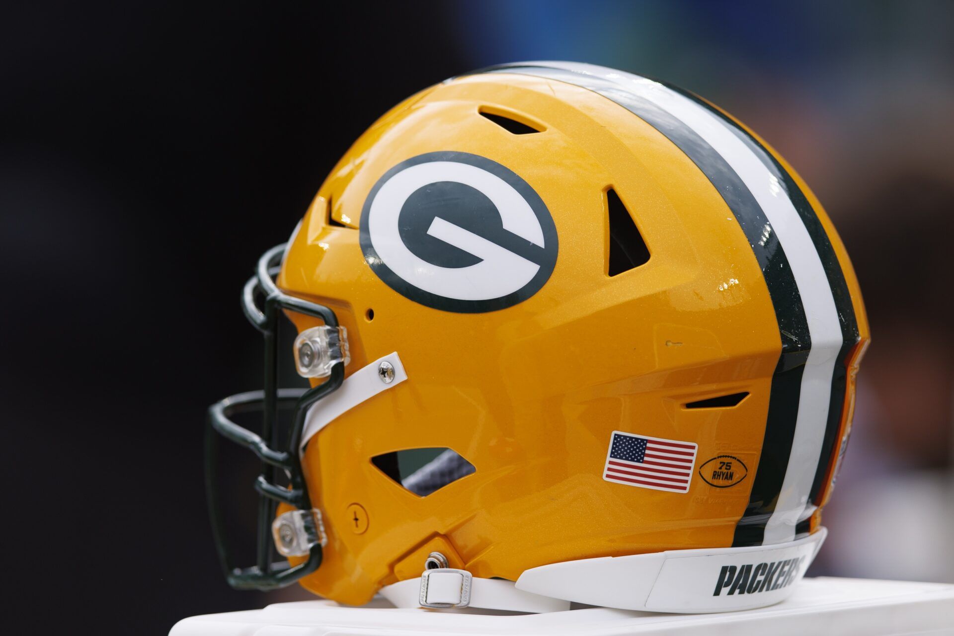 A Green Bay Packers helmet sits on the sidelines during the game against the New Orleans Saints at Lambeau Field.