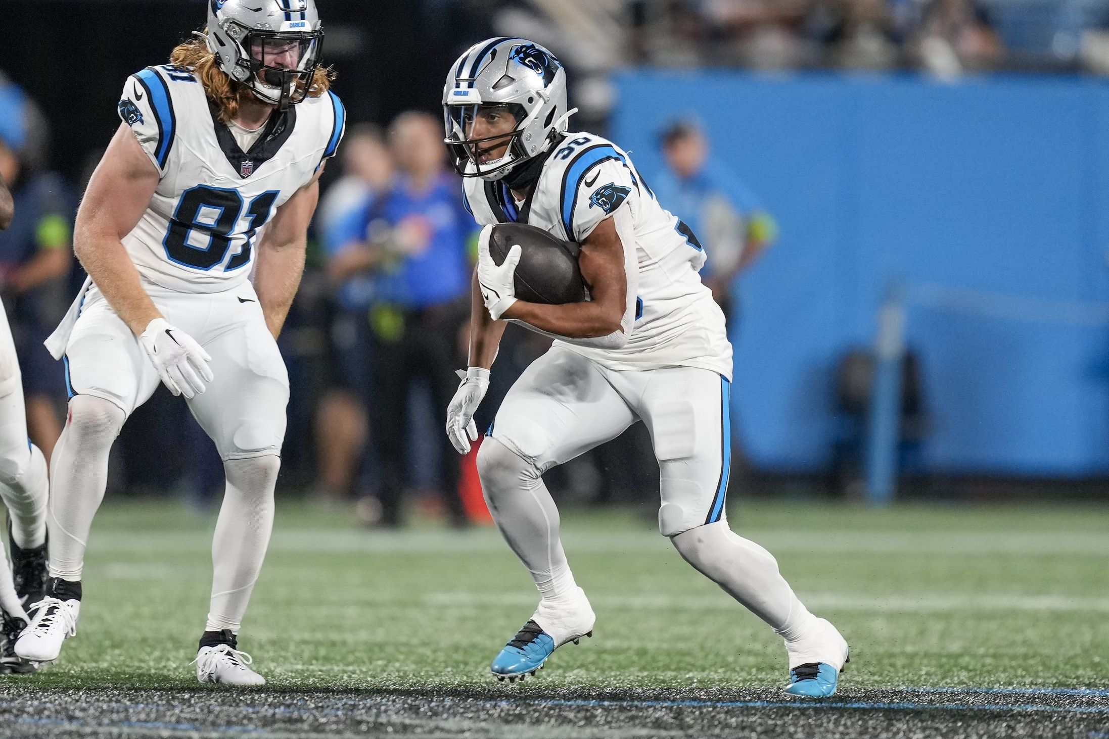 Chuba Hubbard (30) runs the ball during the second half against the New Orleans Saints at Bank of America Stadium.