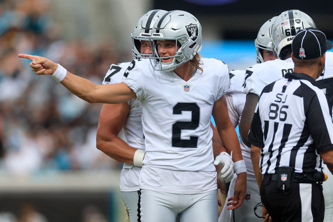 Daniel Carlson (2) reaches to his field goal during the second quarter of a regular season NFL football matchup Sunday, Nov. 6, 2022 at TIAA Bank Field in Jacksonville.