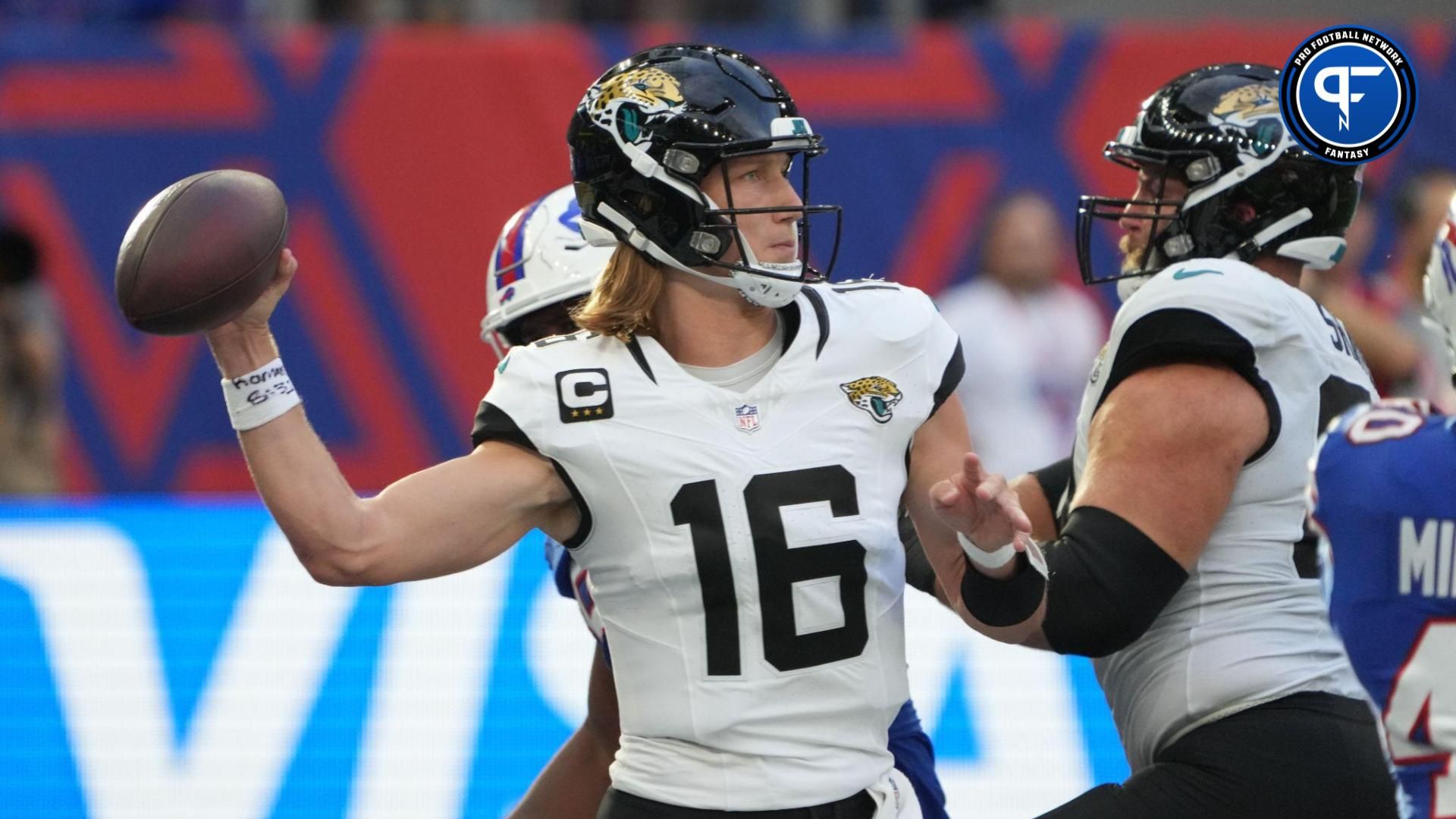 Jacksonville Jaguars quarterback Trevor Lawrence (16) throws the ball against the Buffalo Bills in the second half of an NFL International Series game at Tottenham Hotspur Stadium.