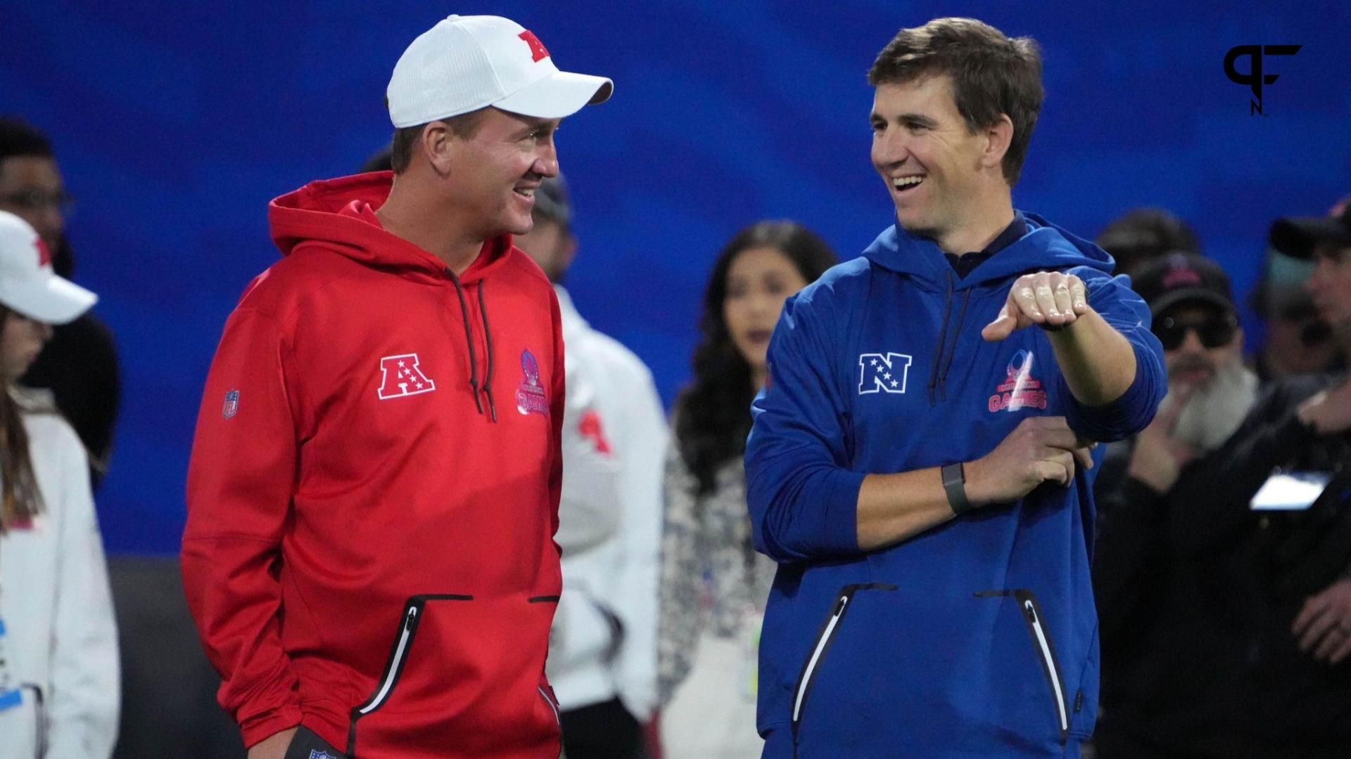 Peyton Manning (left) and Eli Manning react during the Pro Bowl Skills competition at the Intermountain Healthcare Performance Facility.