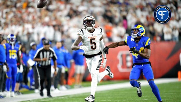 Cincinnati Bengals WR Tee HIggins runs for a deep pass against Los Angeles Rams defender.