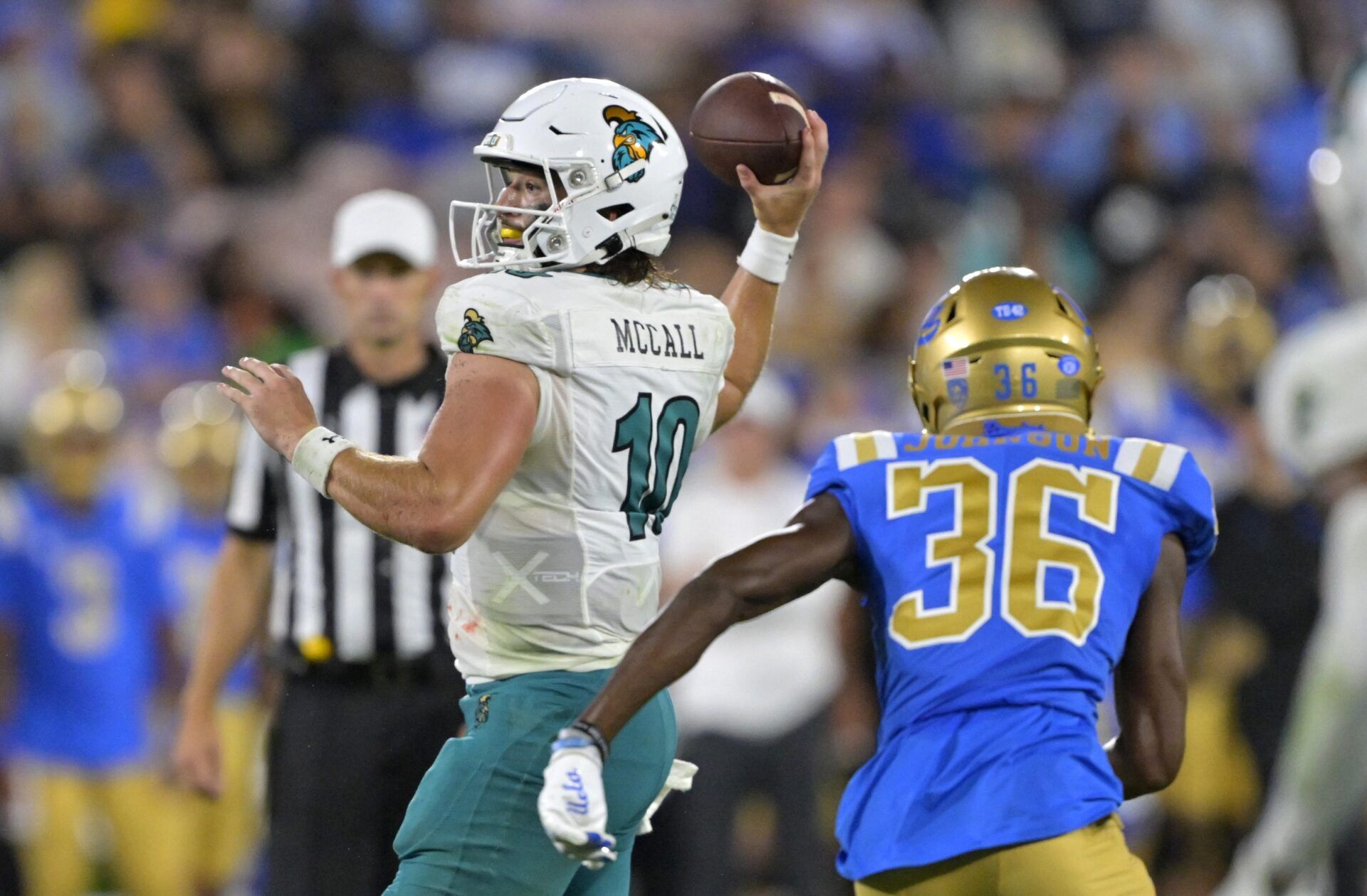 Coastal Carolina QB Grayson McCall throws a pass against UCLA.