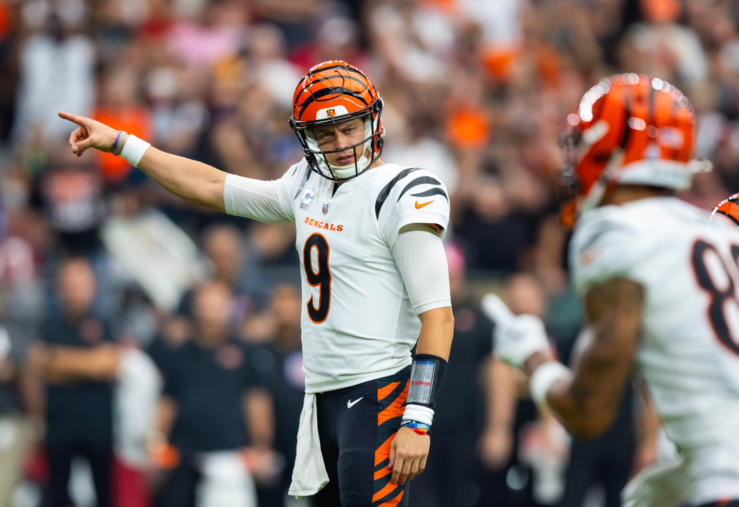 Oct 8, 2023; Glendale, Arizona, USA; Cincinnati Bengals quarterback Joe Burrow (9) reacts against the Arizona Cardinals at State Farm Stadium.