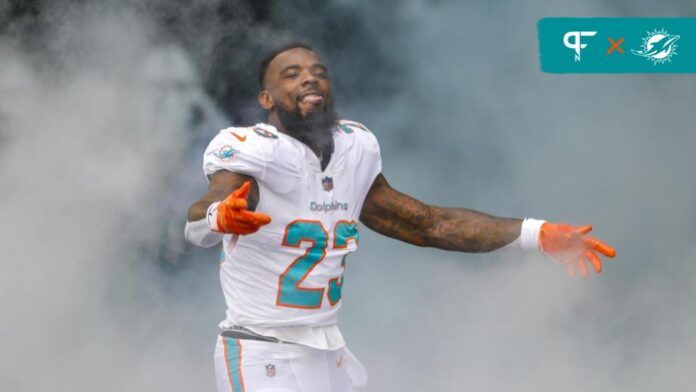 Jeff Wilson Jr. (23) takes the field prior to a game against the Houston Texans at Hard Rock Stadium.