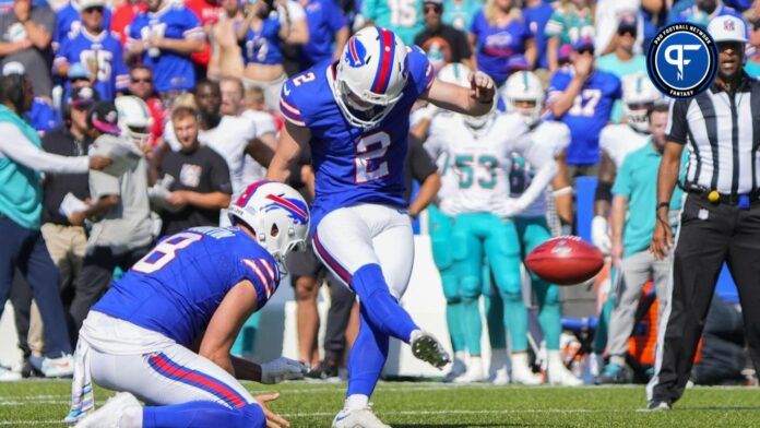 Tyler Bass (2) kicks an extra point against the Miami Dolphins during the first half at Highmark Stadium.