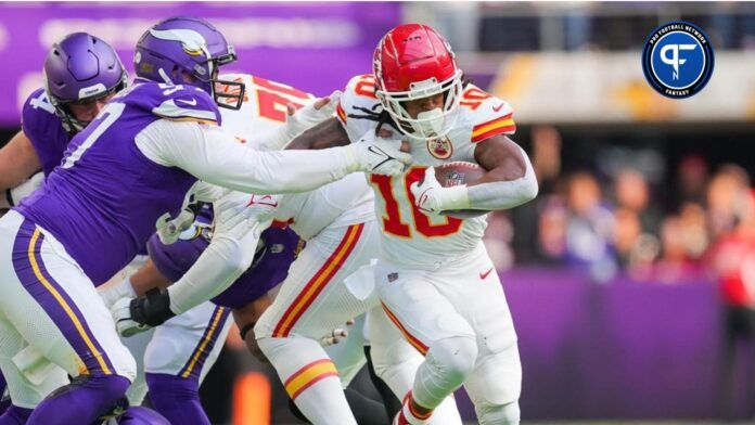 Isiah Pacheco (10) runs with the ball against the Minnesota Vikings in the first quarter at U.S. Bank Stadium.