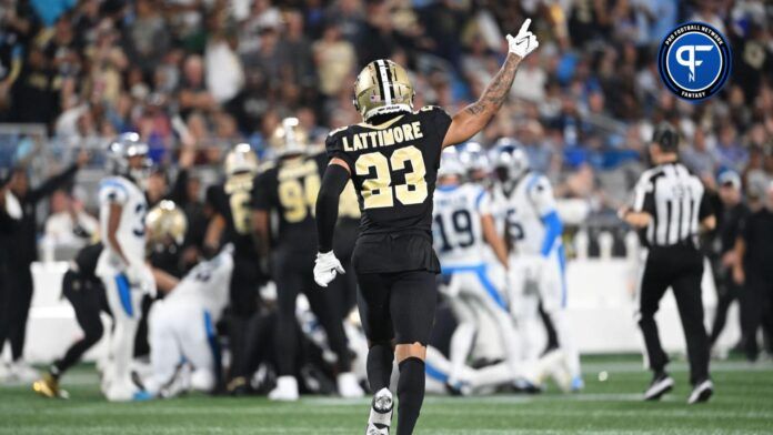 Marshon Lattimore (23) signals a turnover by Carolina Panthers in the second quarter at Bank of America Stadium.