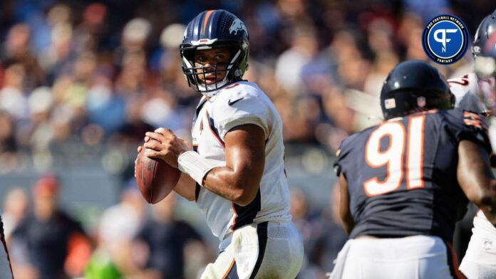 Russell Wilson (3) passes against the Chicago Bears at Soldier Field.