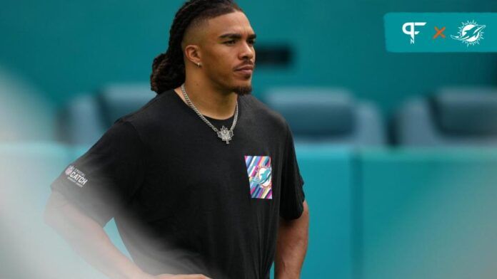 Chase Claypool stands on the field prior to the game against the New York Giants at Hard Rock Stadium.