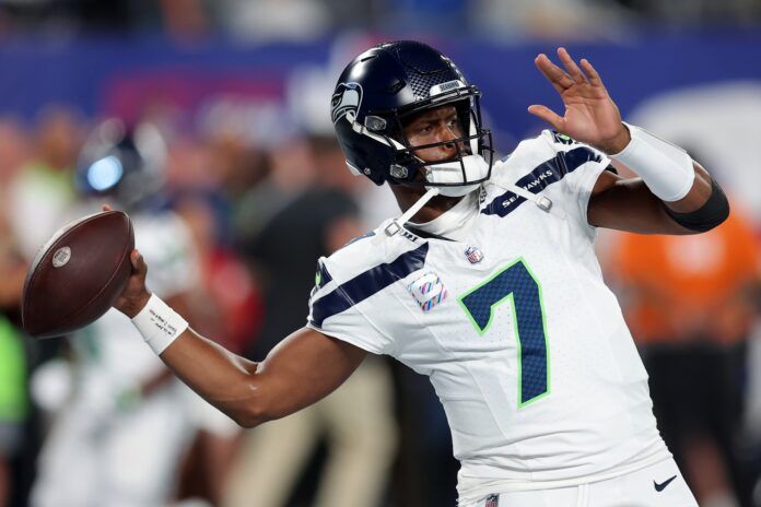 Geno Smith (7) warms up before a game against the New York Giants at MetLife Stadium.