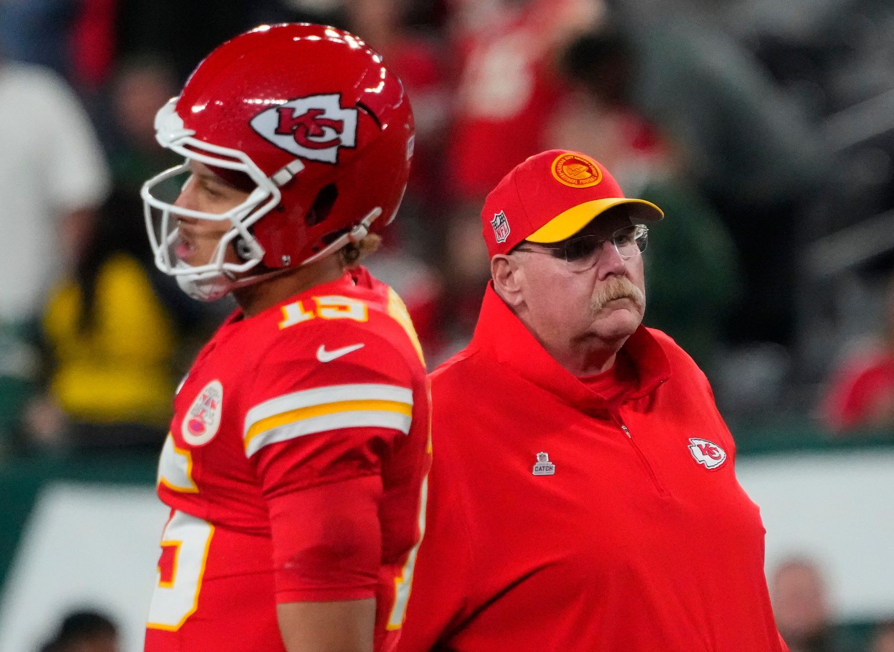 Patrick Mahomes (15) and Kansas City Chiefs head coach Andy Reid pre game against the Jets at MetLife Stadium.