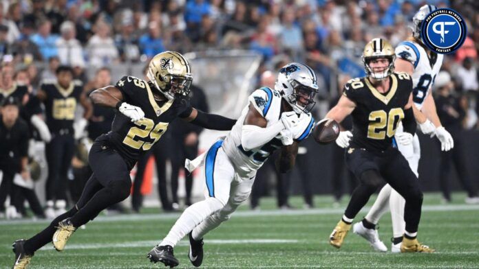 Carolina Panthers wide receiver Jonathan Mingo (15) is unable to catch the ball as New Orleans Saints cornerback Paulson Adebo (29).