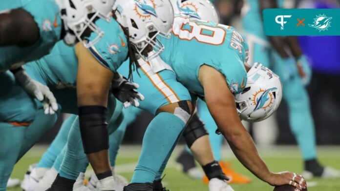 Miami Dolphins center Connor Williams (58) gets set to snap the ball.