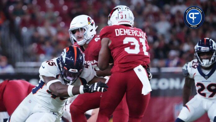 Denver Broncos linebacker Christopher Allen (45) tackles Arizona Cardinals running back Emari Demercado (31) during the second half at State Farm Stadium.