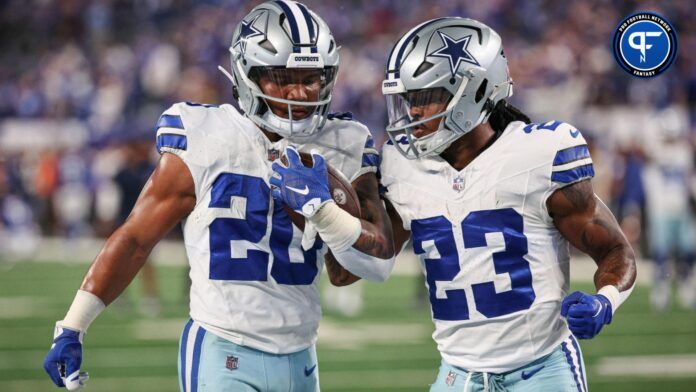 Dallas Cowboys RB's Tony Pollard and Joshua Palmer warming up before game against the New York Giants.