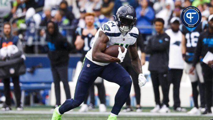 Seattle Seahawks wide receiver DK Metcalf (14) runs for yards after the catch against the Carolina Panthers during the second quarter at Lumen Field.