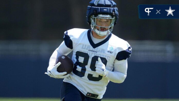 Dallas Cowboys tight end Peyton Hendershot (89) wears a Guardian helmet cap during training camp at the River Ridge Fields.