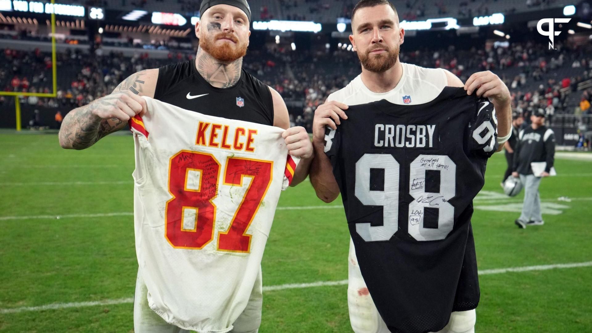 Las Vegas Raiders defensive end Maxx Crosby (left) and Kansas City Chiefs tight end Travis Kelce pose after exchanging jerseys after the game at Allegiant Stadium.