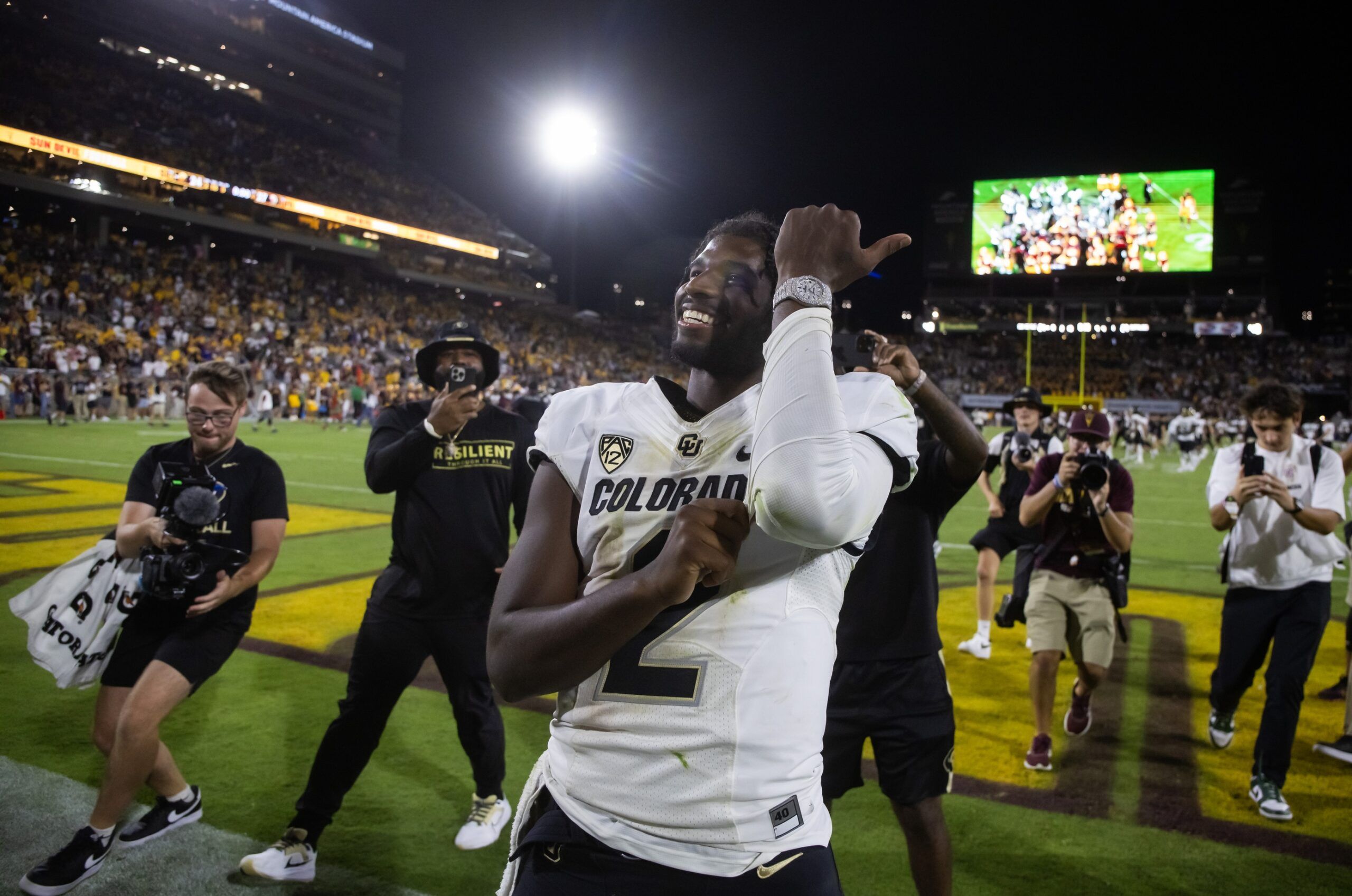 Shedeur Sanders (2) celebrates after defeating the Arizona State Sun Devils at Mountain America Stadium, Home of the ASU Sun Devils.