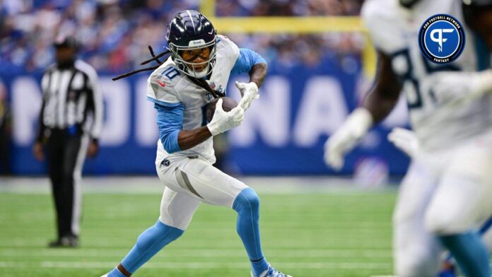 Tennessee Titans wide receiver DeAndre Hopkins (10) catches a pass and looks toward the end zone during the second half against the Indianapolis Colts at Lucas Oil Stadium.