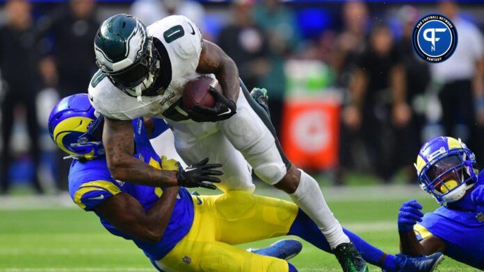 Philadelphia Eagles running back D'Andre Swift (0) runs the ball against Los Angeles Rams safety Jordan Fuller (4) during the second half at SoFi Stadium.